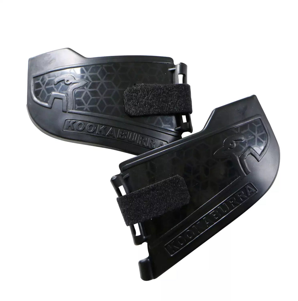 Two black Kookaburra Cricket Helmet Neck Guards by Kookaburra feature hexagonal patterns, Velcro straps, the embossed KOOKABURRA name, and bird logos on each guard to enhance cricket safety.