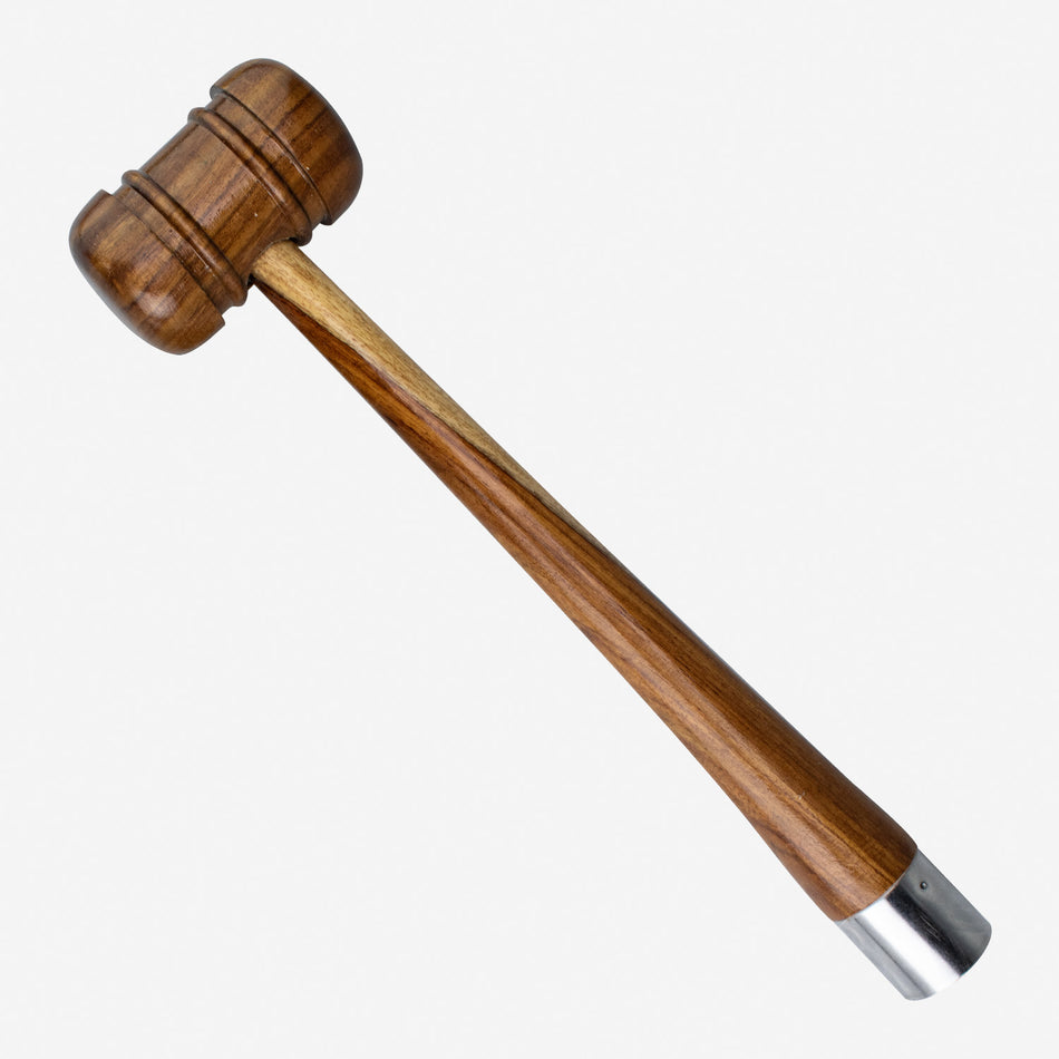 The Kookaburra Combination Bat Mallet & Gripping Cone by Kookaburra features a cylindrical wooden head, long handle with metal cap, and resembles a cricket bat mallet, isolated on a white background.
