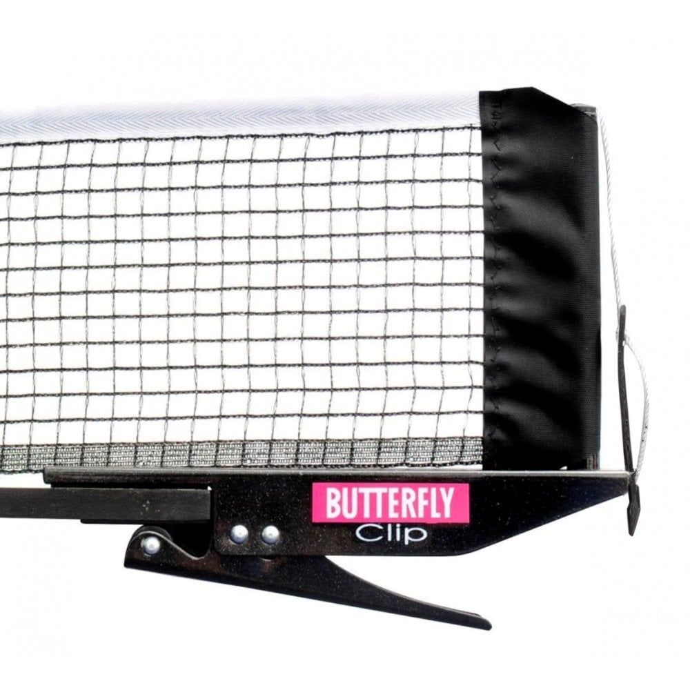 A close-up of the Butterfly Clip Net and Post by Butterfly shows a table tennis net attached to the table with a black clamp labeled “Butterfly Clip.” The metal post features white trim along the top, black edging on the sides, and a durable nylon net with a built-in tension adjuster for optimal play.