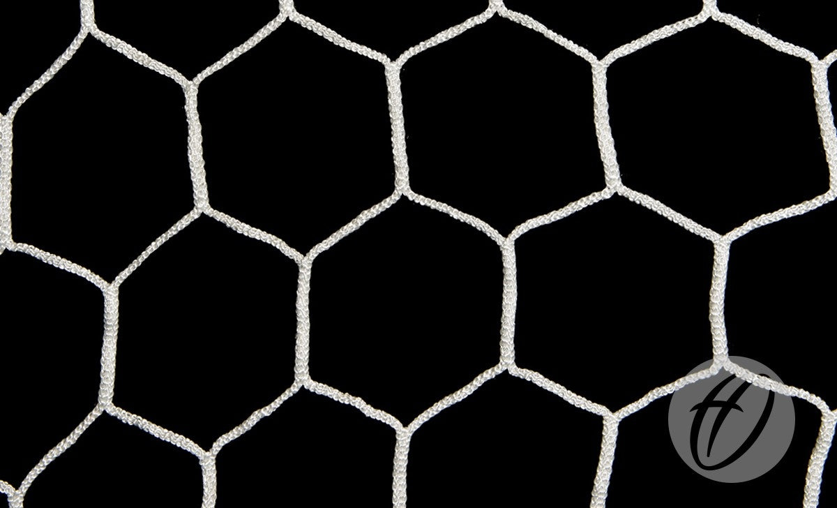 Close-up of a white hexagonal net pattern, reminiscent of a box-shaped football net made from 4mm braided nylon, set against a black background, with a gray circle containing a stylized H in the lower right corner. Product shown: Harrod Sport 4mm Hexagonal Net - Senior 2m Runback.