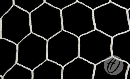 Close-up of a white hexagonal net pattern, reminiscent of a box-shaped football net made from 4mm braided nylon, set against a black background, with a gray circle containing a stylized H in the lower right corner. Product shown: Harrod Sport 4mm Hexagonal Net - Senior 2m Runback.