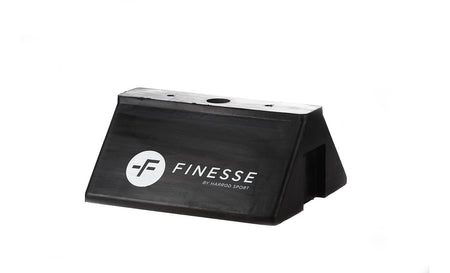 The Finesse Mannequin Base is a black, rectangular plastic base with a sloped front and white "FINESSE" branding, designed for agility poles or training mannequins. Shown against a plain white background.