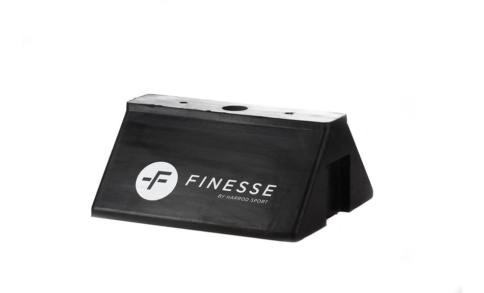The Finesse Mannequin Base is a black, rectangular plastic base with a sloped front and white "FINESSE" branding, designed for agility poles or training mannequins. Shown against a plain white background.