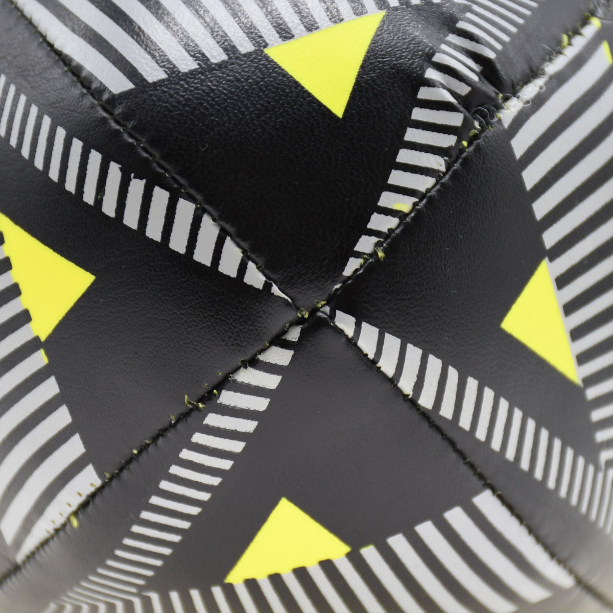 Close-up of the stitched panel seams and grey stripes on the Soft Play Rugby Ball