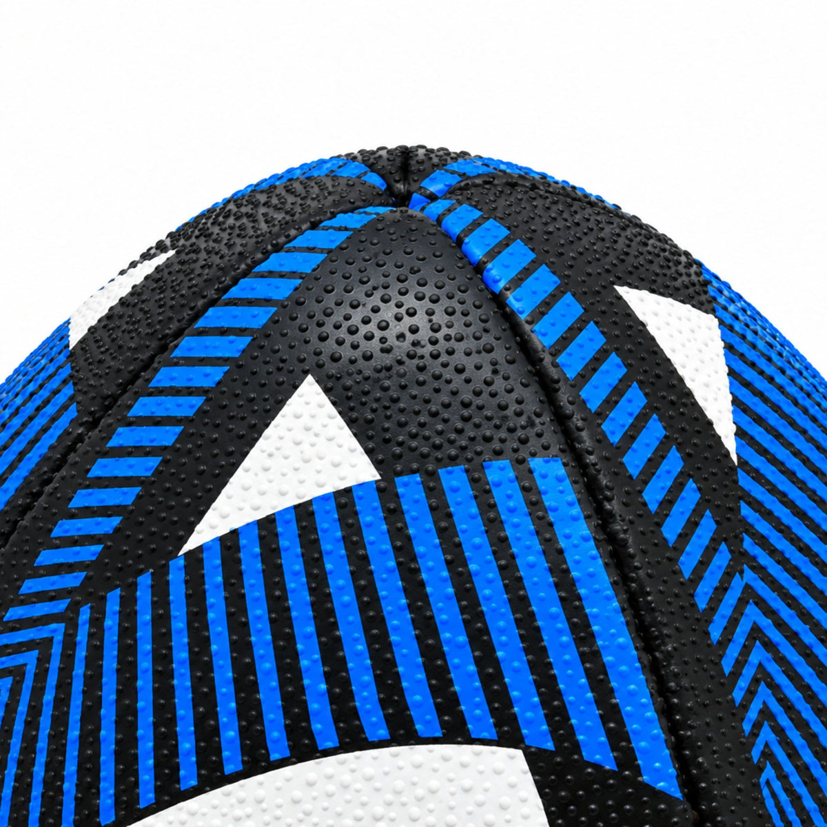 Close-up of the blue and black patterned panels on top of the Reflex Rugby Trainer Ball