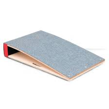 The Niels Larsen Junior Short Springboard by Niels Larsen is a curved wooden balance board with a textured gray antimicrobial carpet surface and a red accent on one side.