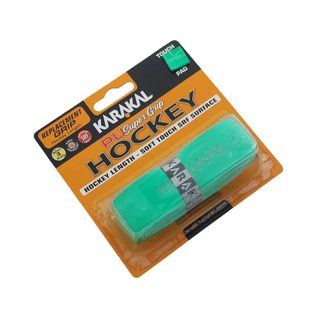 The Karakal XL PU Super Hockey Grip is a cushioned replacement grip for hockey sticks, supplied in orange and black packaging and secured with a branded band. The package is labeled “Hockey Length • Soft Touch SR Surface” and displays the rolled-up grip inside.