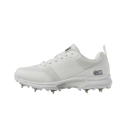 The Gunn & Moore Kryos Cricket Spikes 2024 are white athletic shoes with steel spikes, a breathable mesh and synthetic upper, lace-up design, and GM branding near the heel—perfect for cricket.