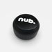 A black, round plastic cricket bat handle attachment by nub Sports, featuring "nub." in white lowercase letters on top, is shown against a plain white background. Product name: nub - Black.