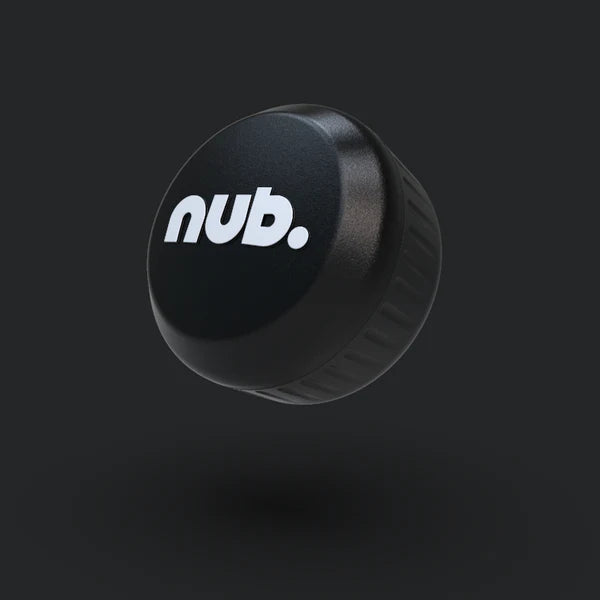 The nub - Black by nub Sports is a round, black silicone cricket grip with "nub." in white lowercase on top, floating against a dark background—a sleek bat handle upgrade for your next game.