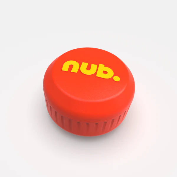 The nub Sports "nub - Orange Scorch" is a round, ribbed orange container with nub. in bold yellow on the lid, ideal for storing your cricket bat accessory or silicone grip, shown on a plain white background.