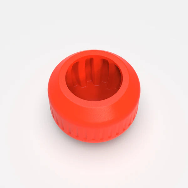 The nub Sports nub - Orange Scorch is a vibrant orange, round silicone cricket bat handle grip with ridged inner and outer edges and a hollow center, shown from above against a plain light background.