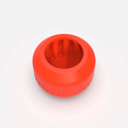The nub Sports nub - Orange Scorch is a vibrant orange, round silicone cricket bat handle grip with ridged inner and outer edges and a hollow center, shown from above against a plain light background.