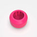 The nub Sports nub - Pink Six is a bright pink, round, ridged jar opener with a silicone bat grip-inspired interior for securely twisting open lids. Shown on a plain white background.