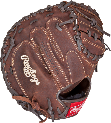 A Rawlings Player Preferred Catchers Mitt in brown full-grain leather features black laces, visible stitching, the Rawlings logo, and "THE GOLD GLOVE CO." embossed on the glove.