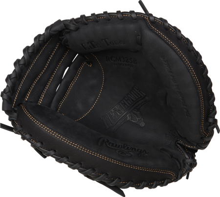 A close-up of the Rawlings Renegade Catchers Mitt, an open black leather glove with tan stitching, reveals its cushioned palm and embossed Rawlings logos.