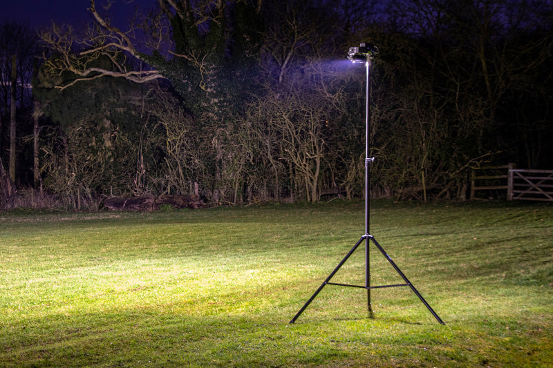 The Ritelite Sports Lite Portable Floodlights provide bright, portable lighting on a tall tripod stand—perfect for illuminating grassy areas at night for sports training or outdoor activities.