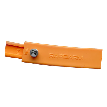 An orange RapidArm+ Ball Thrower by RapidArm with a silver R-marked bolt and "140 kph" on the side is shown on a plain white background.