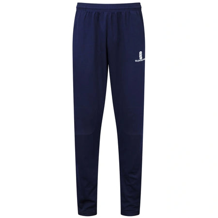 The Surridge Blade Coloured Playing Trouser in navy features an elastic waistband, knee reinforcement for durability, and a small white Surridge logo on the left thigh, shown against a white background.