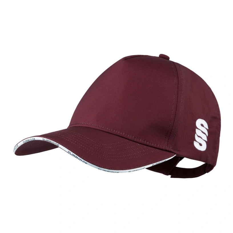 The Surridge Baseball Cap by Surridge is maroon with a 5-panel structured design, curved brim edged in white trim with black text, mesh-reinforced front, side white lettering, and an adjustable back strap.