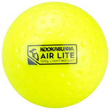 The Kookaburra Air Lite Dimple Hockey Ball in yellow features a dimpled surface, black logo and text, weighs 100g, and is an ideal lightweight training aid from the trusted Kookaburra range.