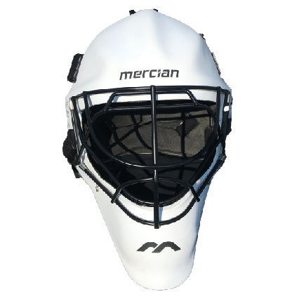 The Mercian Genesis Hockey Helmet features a white fibreglass shell, cats-eye grill for superior protection, inner cushioning, and “mercian” branding on the front.