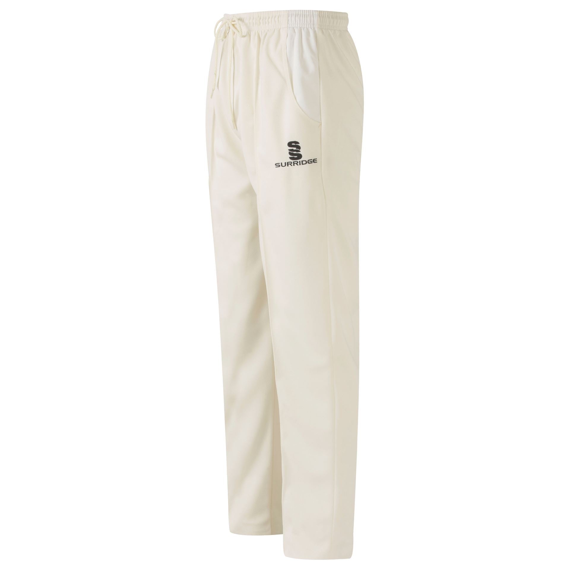 The Surridge Gloucestershire Gipsies Match Cricket Trousers are cream-colored, made from durable polyester twill, with an elastic waistband, drawstring, side pockets, and a black Surridge logo on the left thigh. Shown on a white background.
