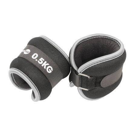 The Fitness Mad Wrist/Ankle Weights by Fitness Mad are black and gray neoprene weights (0.5KG each) with Velcro straps and metal D-rings, ideal for adding resistance to aerobic workouts.