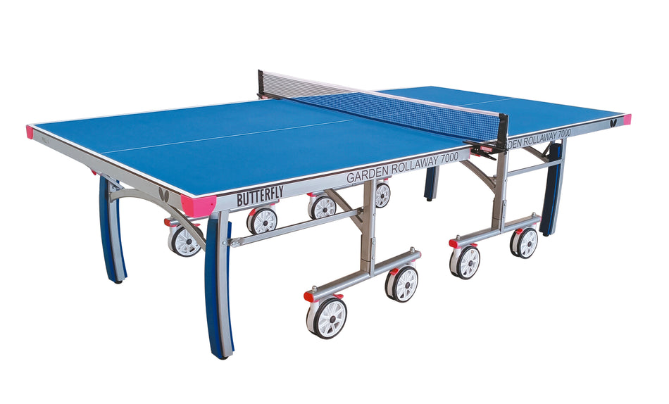 The Butterfly Garden Rollaway 7000 Outdoor Table Tennis Table features a 7mm melamine top, silver frame, white lines, central net, and large wheels for easy mobility.