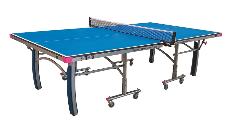 The Butterfly Active 19 Deluxe Rollaway Table Tennis Table by Butterfly features a 19mm top, white net, sturdy metal legs, and wheels for easy movement—fully set up and ready for play.