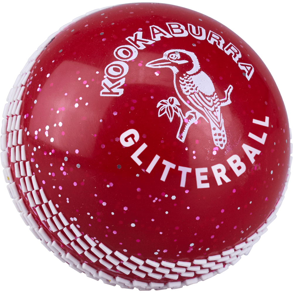 The Kookaburra Glitter ball is a red cricket training ball with white stitching, covered in glitter, featuring the brand name Kookaburra, a kookaburra bird logo, and the text "GLITTERBALL" printed on it.