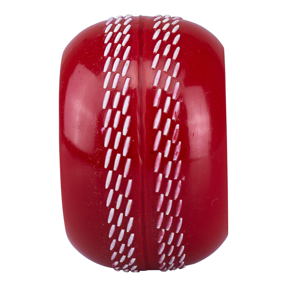 A close-up of the Kookaburra Technique Trainer cricket ball showcases bold white stitching on red leather, set against a plain white background—perfect for refining your release and improving skills with this Kookaburra essential.