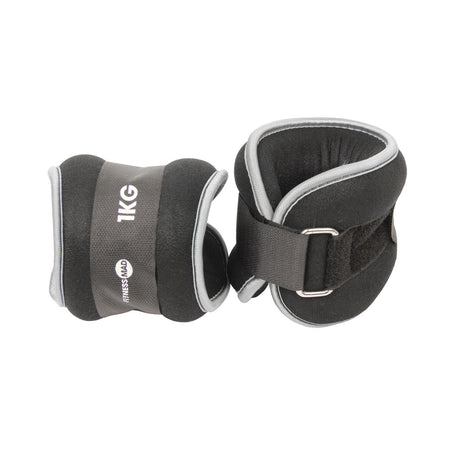 Fitness Mad Wrist/Ankle Weights by Fitness Mad feature black and gray neoprene, Velcro straps, and metal loops—ideal for fitness and strength training. Branded with the Fitness Mad logo, they’re perfect for aerobic workouts.