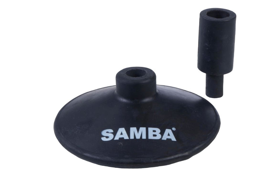 The Samba Sports Multi-Purpose Heavy Duty Pole Base is a black, rubber dome-shaped base with a separate cylindrical attachment—ideal for boundary or corner flag poles. 'SAMBA' is printed in white on the base.