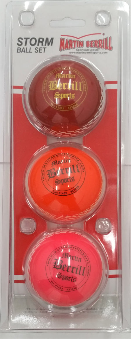 The Martin Berrill Sports Storm Ball Set includes three training balls in red, orange, and pink, each featuring the Martin Berrill Sports logo—perfect for youth cricket coaching sessions.