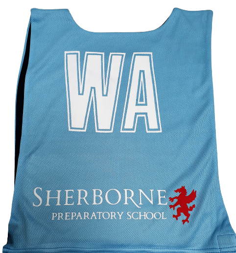 A light blue Personalised Gilbert Netball Bib (Single Bib) by Gilbert, displaying large white WA letters, "Sherborne Preparatory School" text, and a red griffin logo beneath.