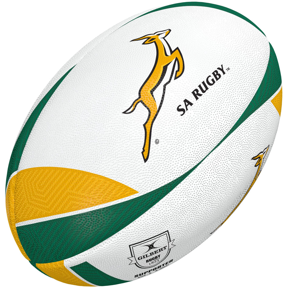 The Gilbert South Africa Supporter Rugby Ball features a white design with green and gold patterns, the Springbok logo, SA RUGBY text, and the Gilbert branding—ideal for South Africa rugby and Rugby World Cup fans.