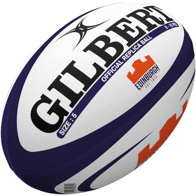 The Gilbert Edinburgh Replica Rugby Ball is a white and navy blue size 5 ball featuring GILBERT branding, the Edinburgh Rugby logo, and “Official Replica Ball” text—celebrating top teams in the United Rugby Championship.