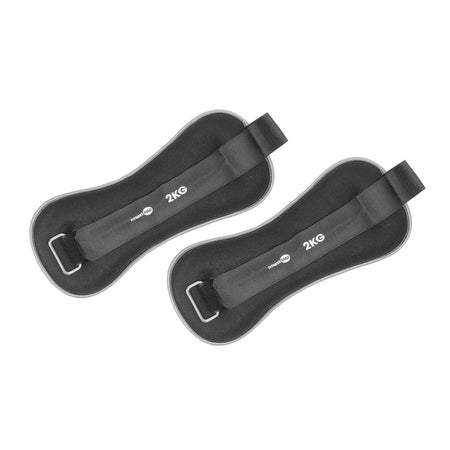 The Fitness Mad Wrist/Ankle Weights by Fitness Mad are black neoprene weights (2 KG each) with adjustable straps and metal loops, perfect for boosting your aerobic workouts.