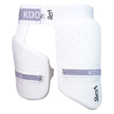 The Kookaburra Pro Guard 250 by Kookaburra is a white thigh guard with grey straps and a black kangaroo logo, featuring a main pad and attached side piece for club level cricket protection.