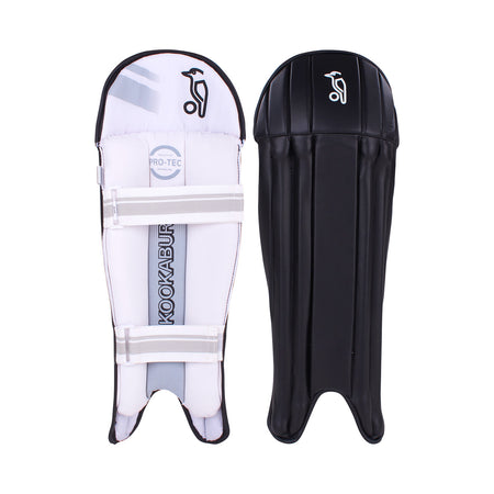 A pair of Kookaburra 4.0 T20 Wicket Keeping Pads in black, featuring a cushioned interior with straps and branding on one pad, and a white logo on the exterior for superior impact protection.