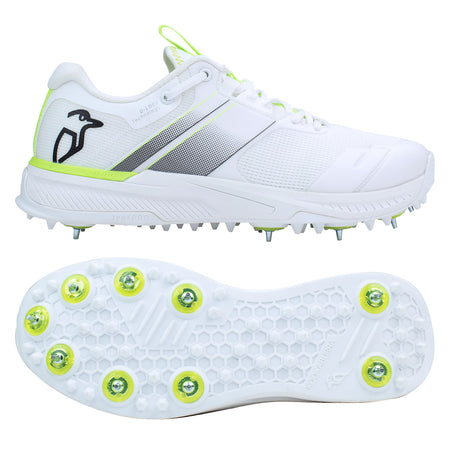 Two views of the Kookaburra KC Players Spike by Kookaburra: a white sports shoe with lime green accents, penguin logo, and metal cricket spikes. The top view shows its lightweight, breathable insole; the bottom view displays spike arrangement.