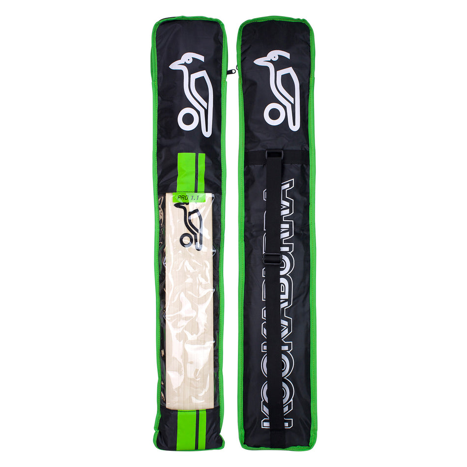 Two Kookaburra Pro 1.1 Bat Covers (black/green, white logo): one open to show a cricket bat inside, the other zipped shut with "KOOKABURRA" in white letters and a carry strap for easy transport.