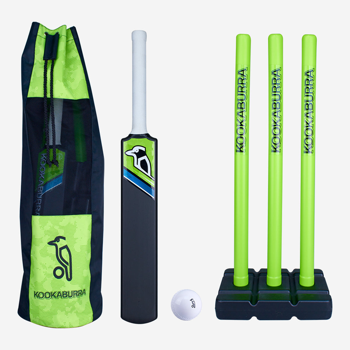The Kookaburra Blast Cricket Set for beginners includes an impact-resistant bat with a white handle, a white ball, three green stumps on a black base, and a green and black bag—all featuring the Kookaburra brand.