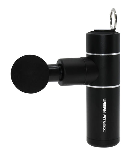 The Urban Fitness Mini Massage Gun, in black with a round attachment and URBAN FITNESS branding on the side, offers muscle soreness relief and is displayed against a white background.