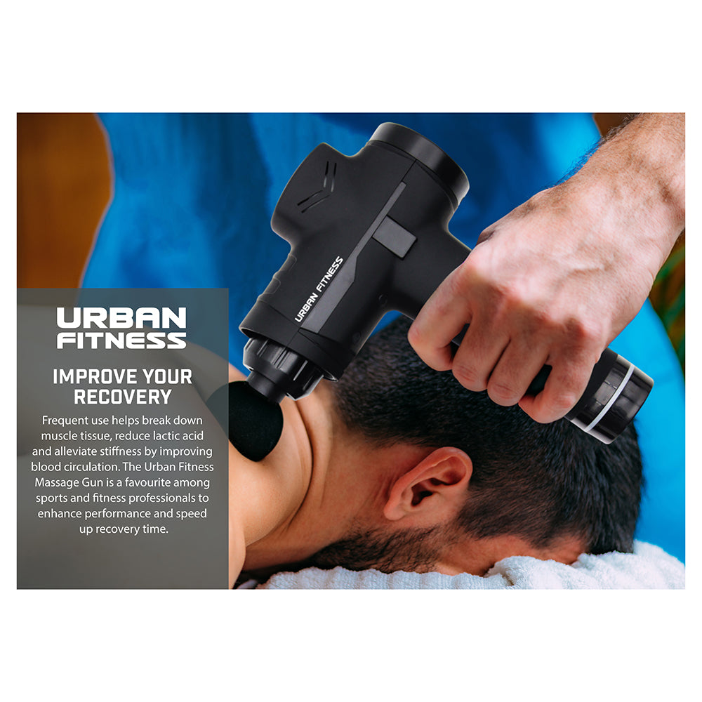An athlete gets muscle pain relief with the Urban Fitness Massage Gun on their shoulder. Text highlights how this black Urban Fitness product benefits athletes and fitness pros by easing muscle aches.