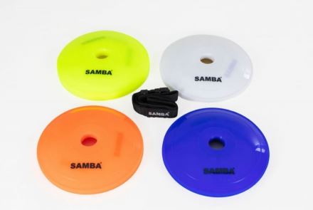 The Samba Flat Marker set by Samba Sports includes four flat, round cones in yellow, white, orange, and blue—each labeled SAMBA—arranged around a black strap on a white background.