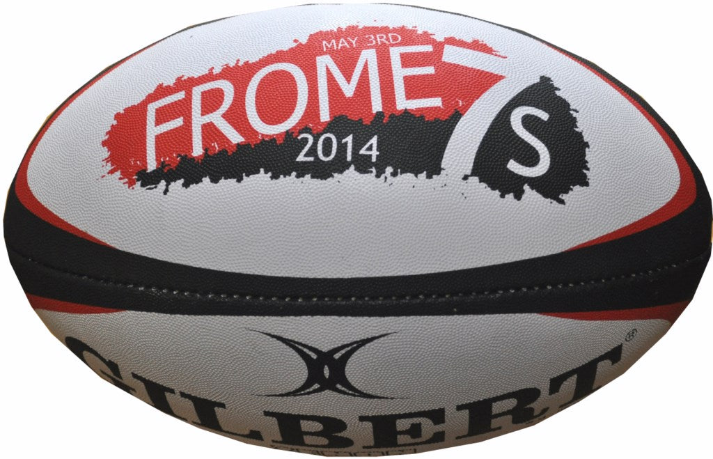 A custom Gilbert match or training rugby ball featuring black and red accents, the text FROME, May 3rd, 2014, a bold S, and partial Gilbert branding. Ideal for anyone wanting personalized rugby balls with logos.