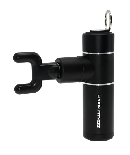 The Urban Fitness Mini Massage Gun is a black, cylindrical portable massager with a U-shaped attachment and metal keyring, designed for fitness use and muscle soreness relief.