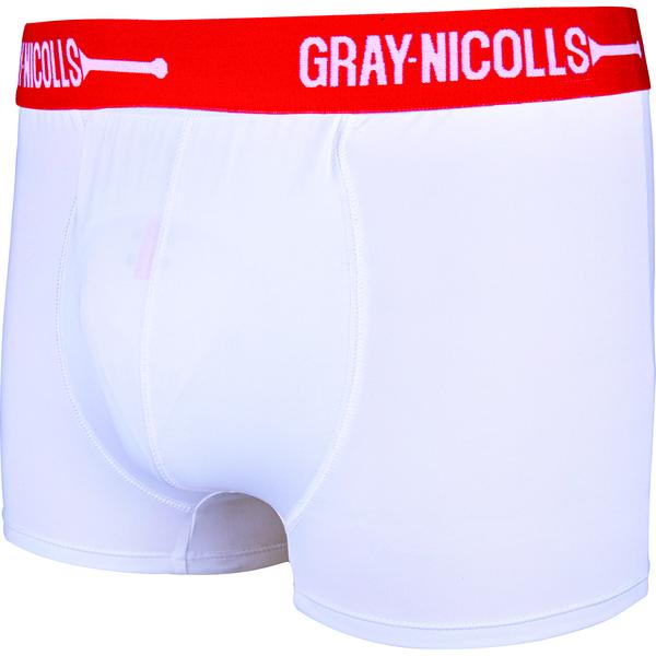 The Gray Nicolls Male Junior Cover Point Jock Trunks are white athletic boxer briefs with a red waistband featuring the GRAY-NICOLLS logo. Designed for cricket, they have an abdo guard pouch for extra protection and comfort during play.